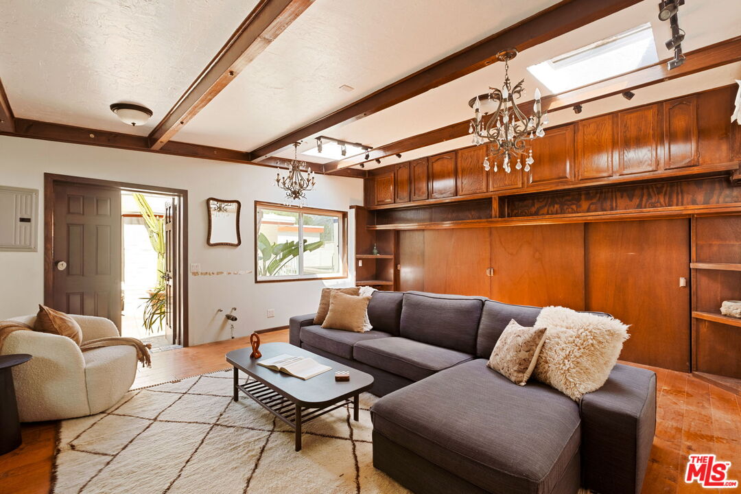 7900 Rim Canyon Road Sunland, CA 91040 - Photo 36 of 46 a living room with furniture and a window