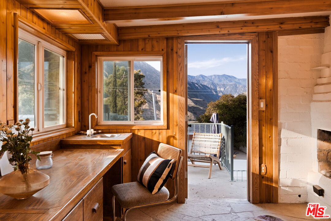 7900 Rim Canyon Road Sunland, CA 91040 - Photo 40 of 46 a room with furniture and a window