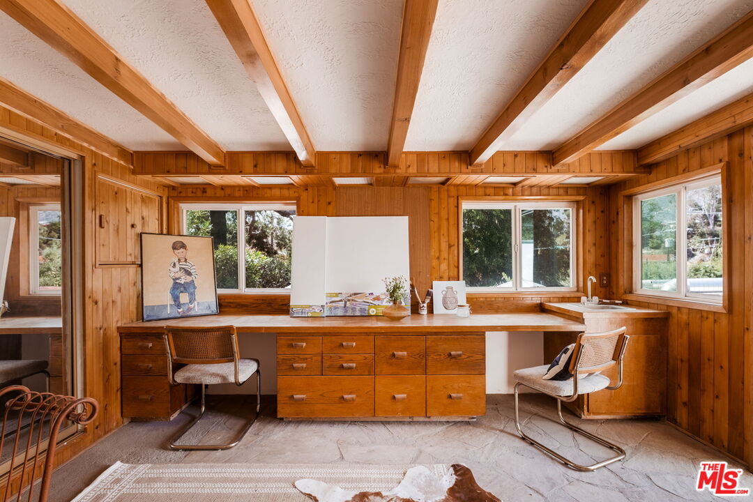 7900 Rim Canyon Road Sunland, CA 91040 - Photo 43 of 46 a room with table chairs and windows