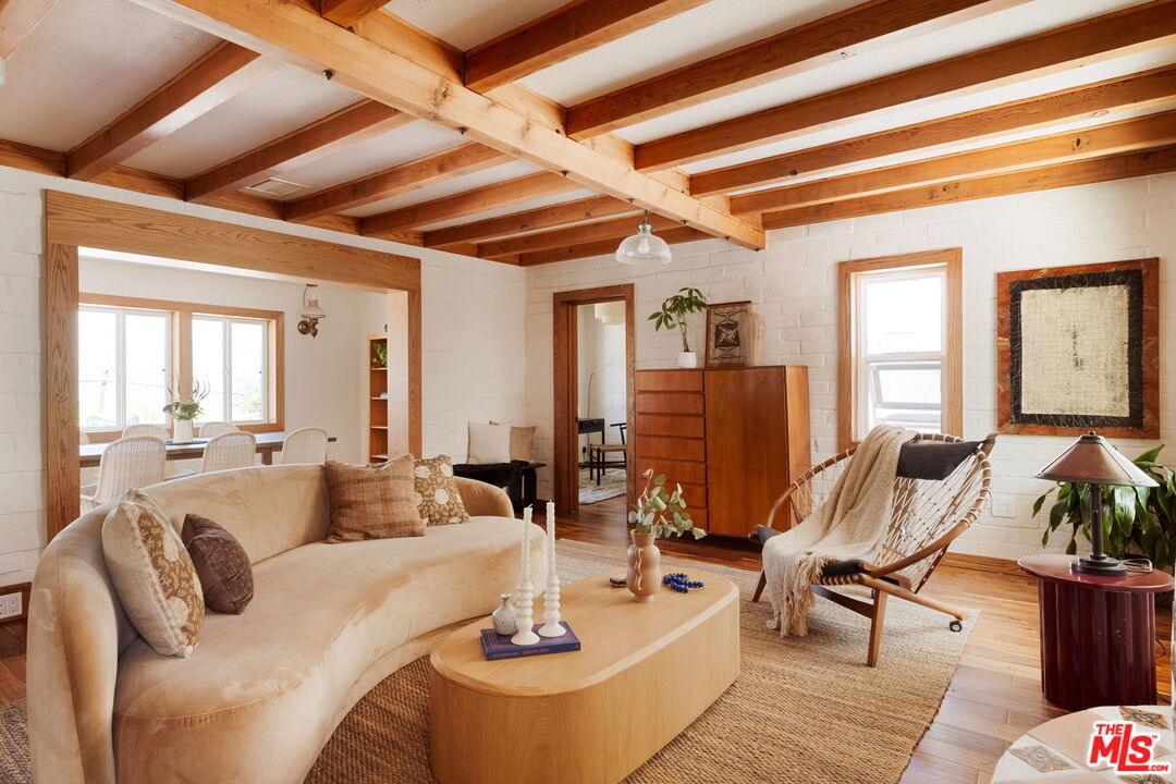 7900 Rim Canyon Road Sunland, CA 91040 - Photo 5 of 46 a living room with furniture and wooden floor