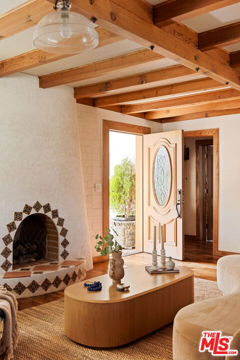 7900 Rim Canyon Road Sunland, CA 91040 - Photo 8 of 46 a living room with furniture and a large window
