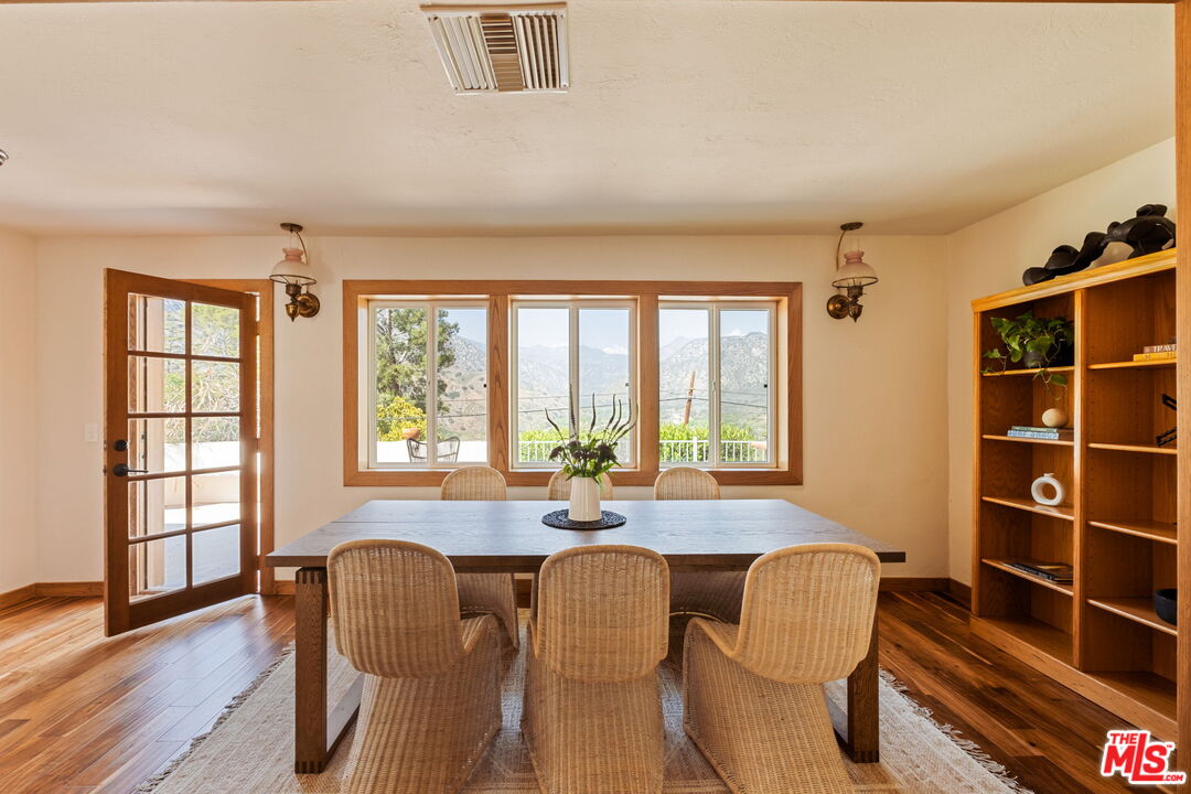7900 Rim Canyon Road Sunland, CA 91040 - Photo 9 of 46 a view of a dining room with furniture and windows