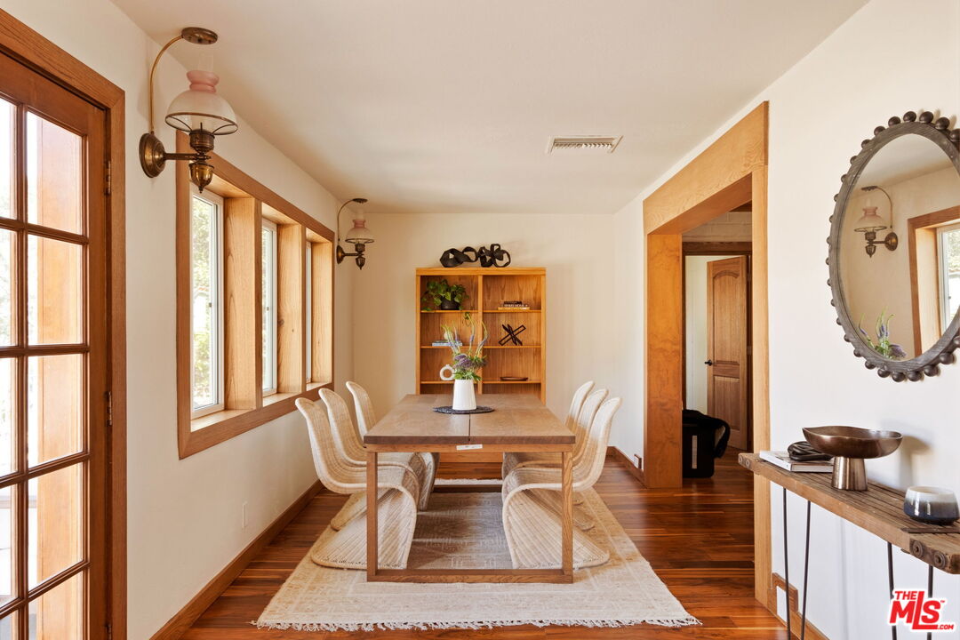 7900 Rim Canyon Road Sunland, CA 91040 - Photo 10 of 46 a living room with furniture a flat screen tv and a window