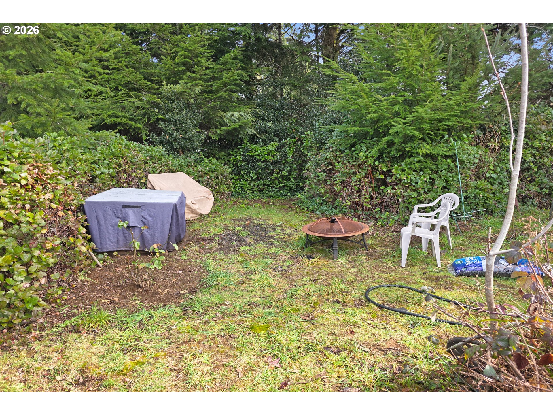 5591 Chittum Loop Florence, OR 97439 - Photo 19 of 23 a bathroom with a sink and a mirror