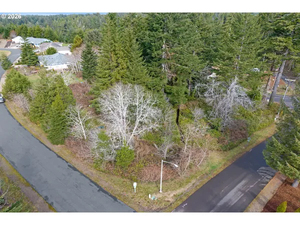a view of a garden from a balcony