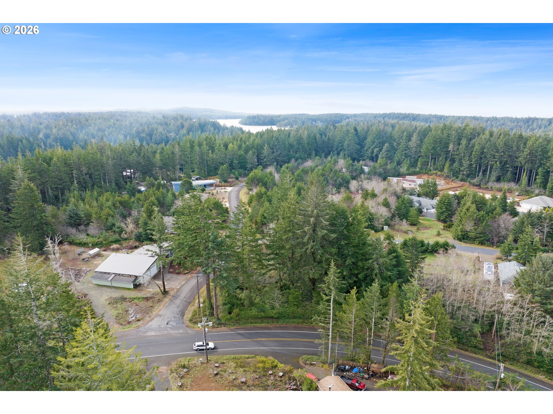 5591 Chittum Loop Florence, OR 97439 - Photo 6 of 23 a view of a yard with mountain view