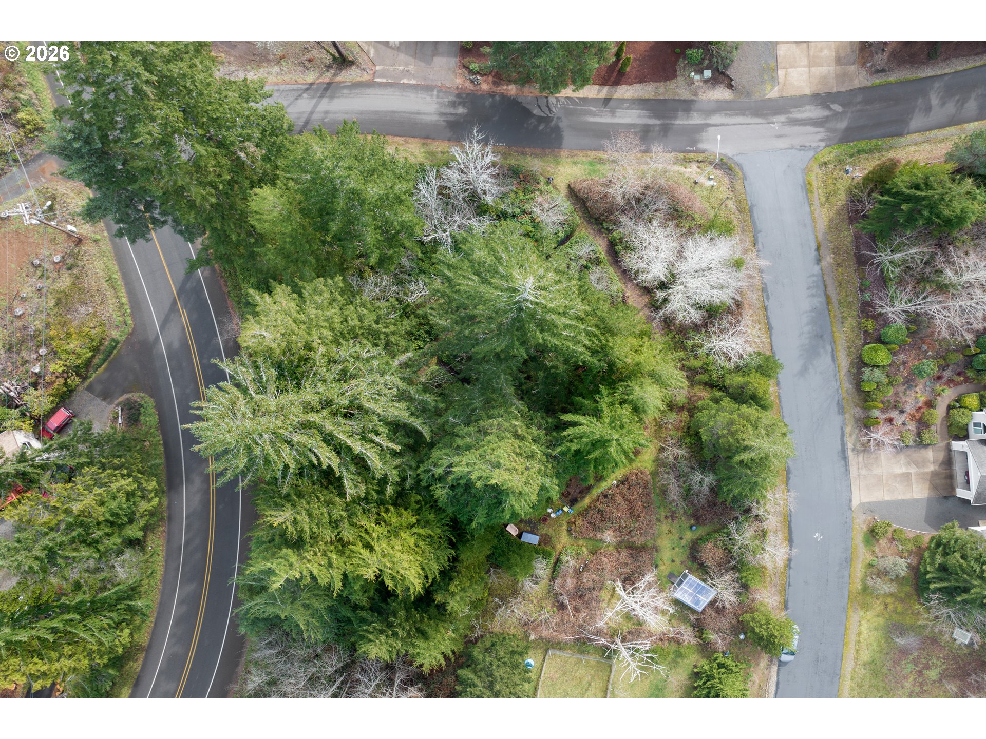 5591 Chittum Loop Florence, OR 97439 - Photo 10 of 23 a view of a lake with a building in the background