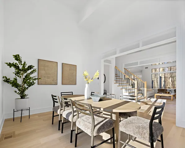 a view of a room with gym equipment and a large window