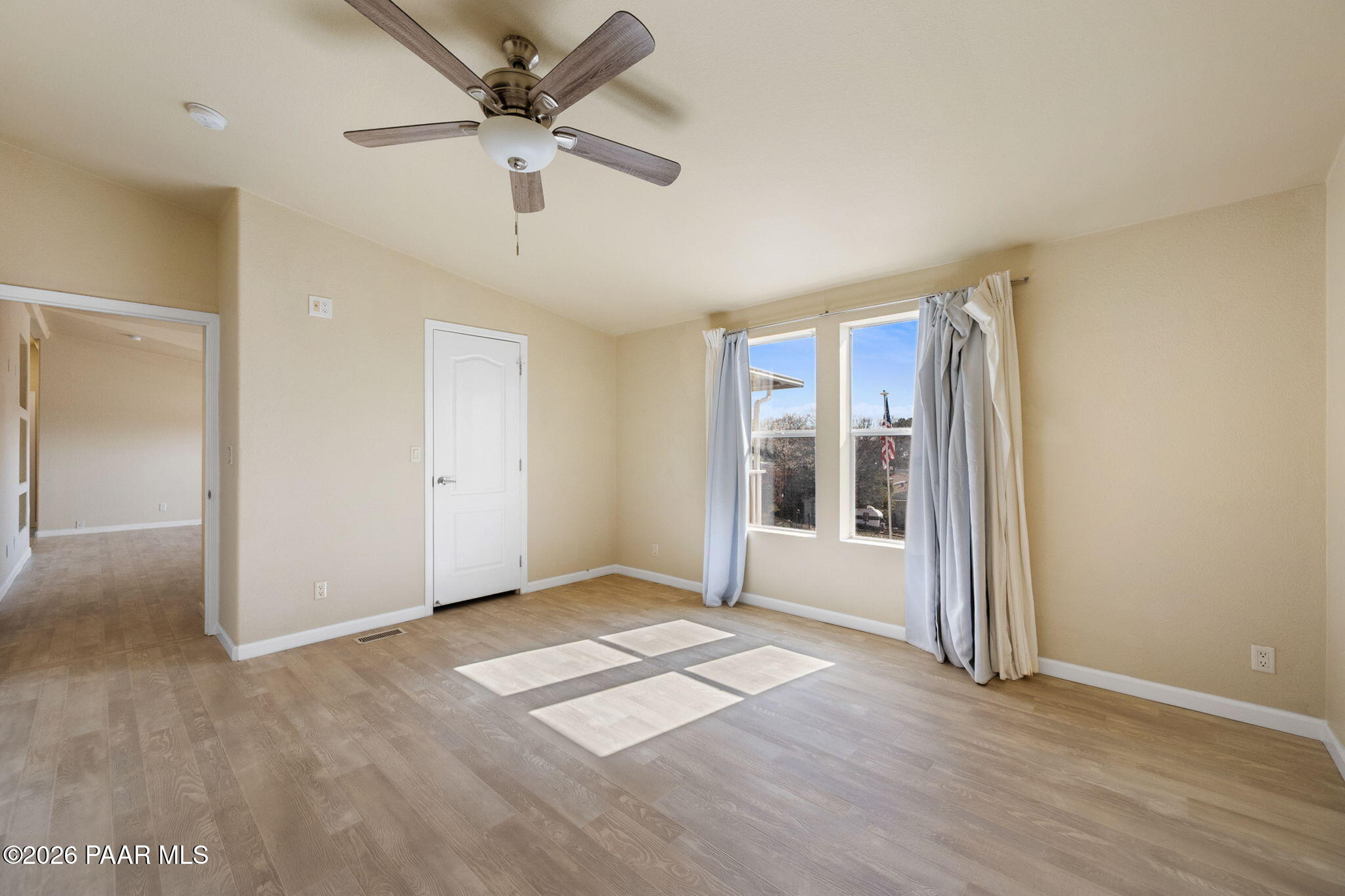 1320 Chestnut Trail Dewey, AZ 86327 - Photo 20 of 32 wooden floor in an empty room with a window
