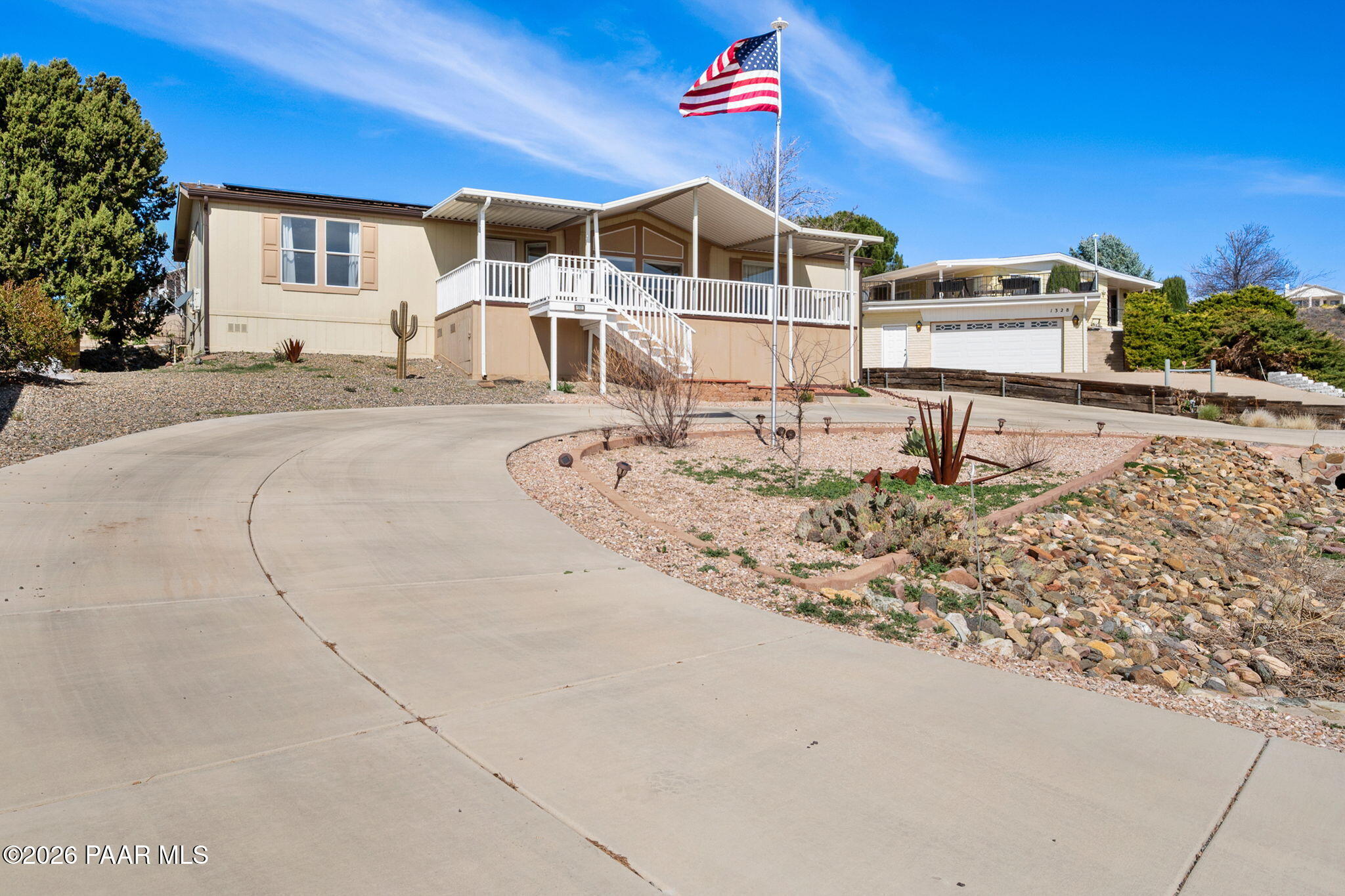 1320 Chestnut Trail Dewey, AZ 86327 - Photo 2 of 32 a view of a house with a snow on the road