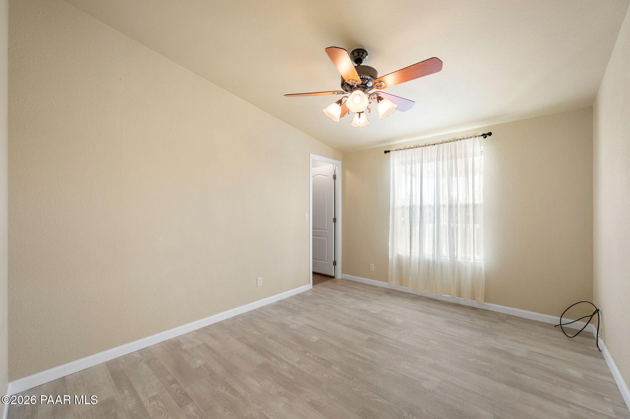 1320 Chestnut Trail Dewey, AZ 86327 - Photo 24 of 32 a view of an empty room with a window