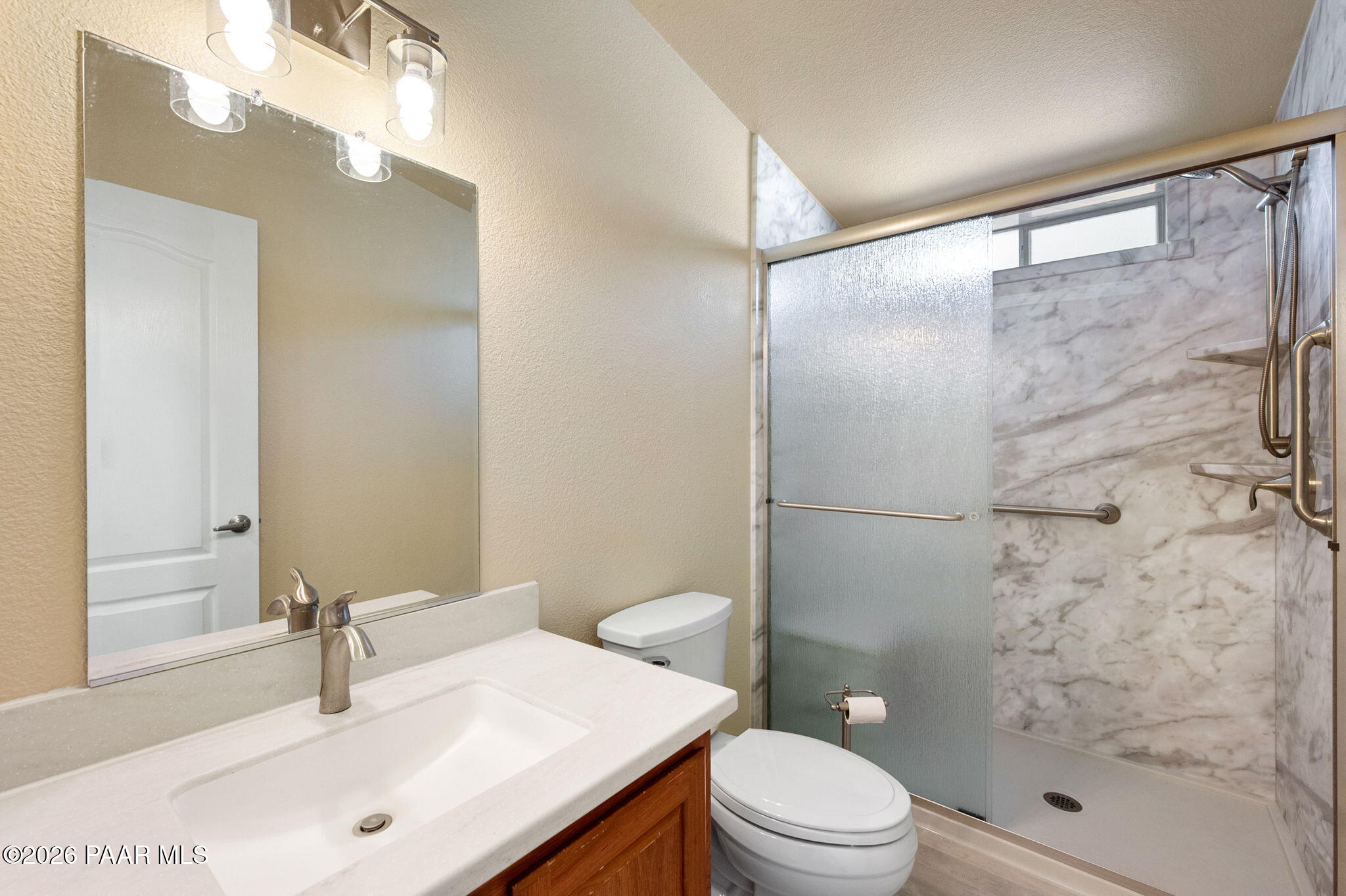 1320 Chestnut Trail Dewey, AZ 86327 - Photo 25 of 32 a bathroom with a sink a toilet and shower