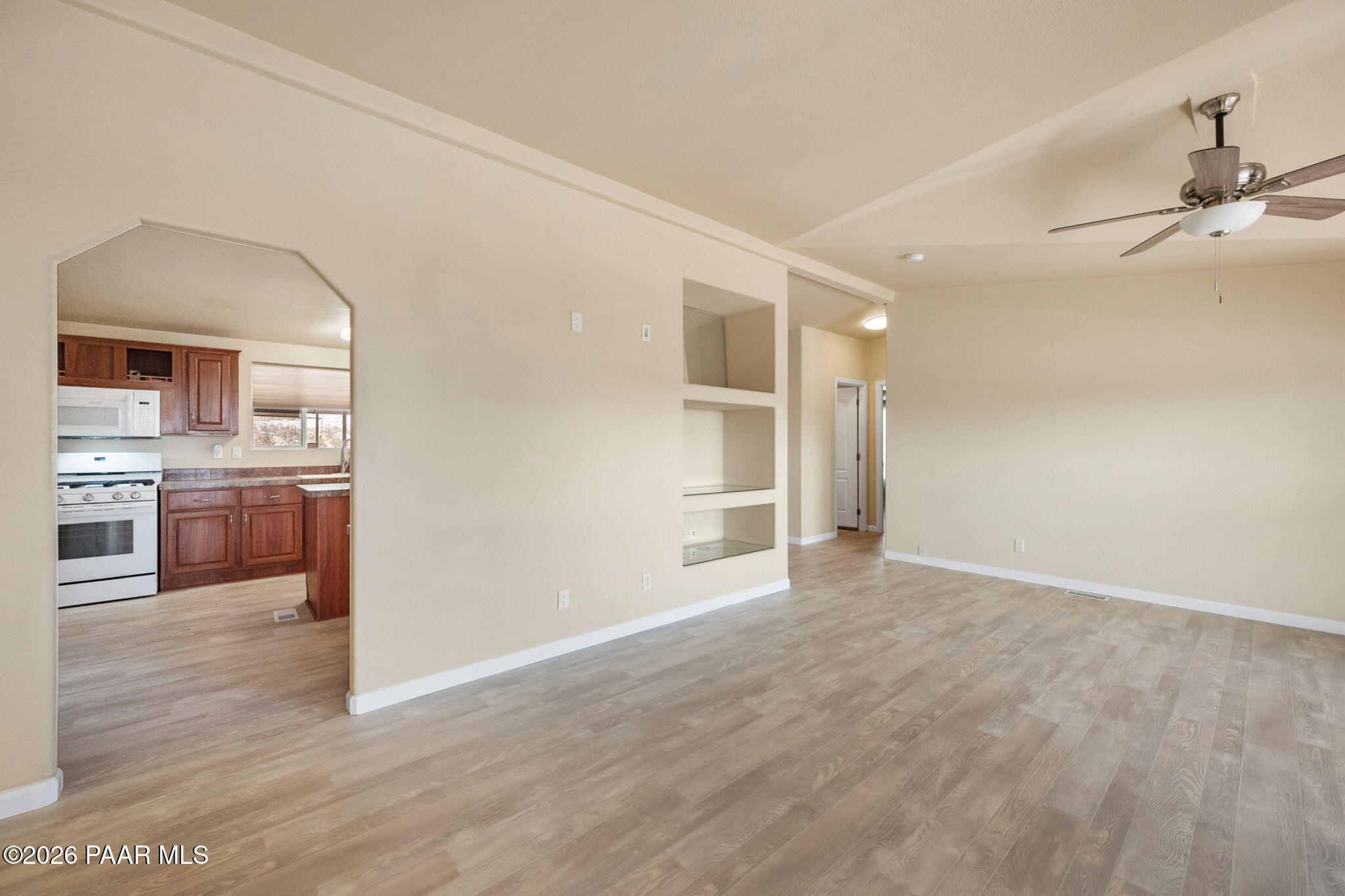 1320 Chestnut Trail Dewey, AZ 86327 - Photo 9 of 32 a view of a kitchen with wooden floor and a sink