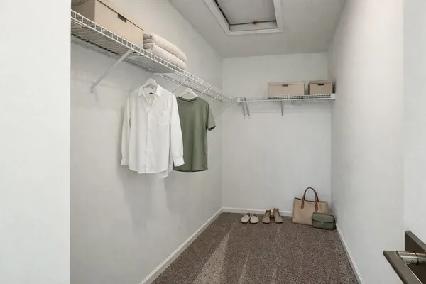 a view of walk in closet with window