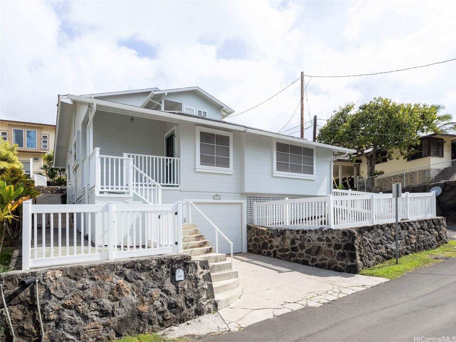 2742 Laniloa Road Honolulu, HI 96813 - Photo 1 of 1 a front view of a house with a yard