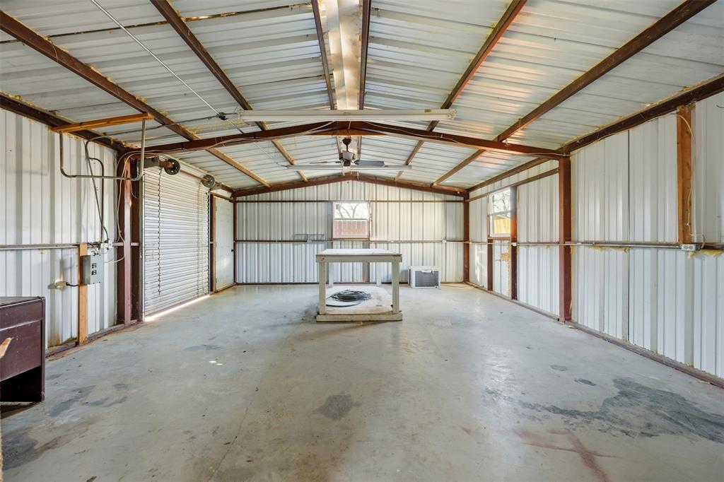 502 Madison Street Cleburne, TX 76033 - Photo 26 of 30 a view of an empty room with a window