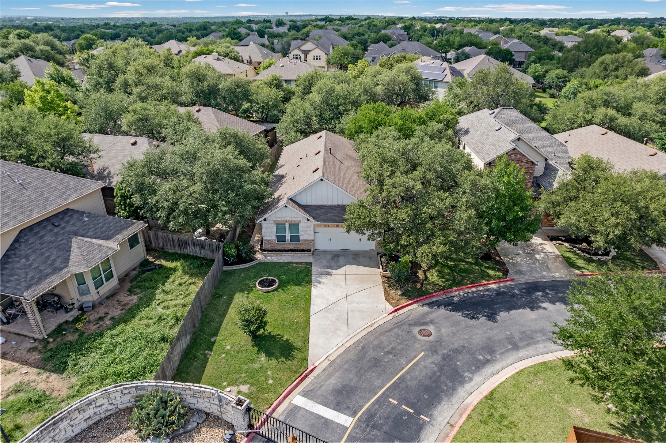 3451 Mayfield Ranch Boulevard, Unit 201 Round Rock, TX 78681 - Photo 25 of 29 an aerial view of a house with a garden