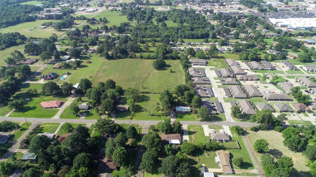 Tbd Pine Mill Road Paris, TX 75462 - Photo 5 of 7 an aerial view of residential houses with outdoor space