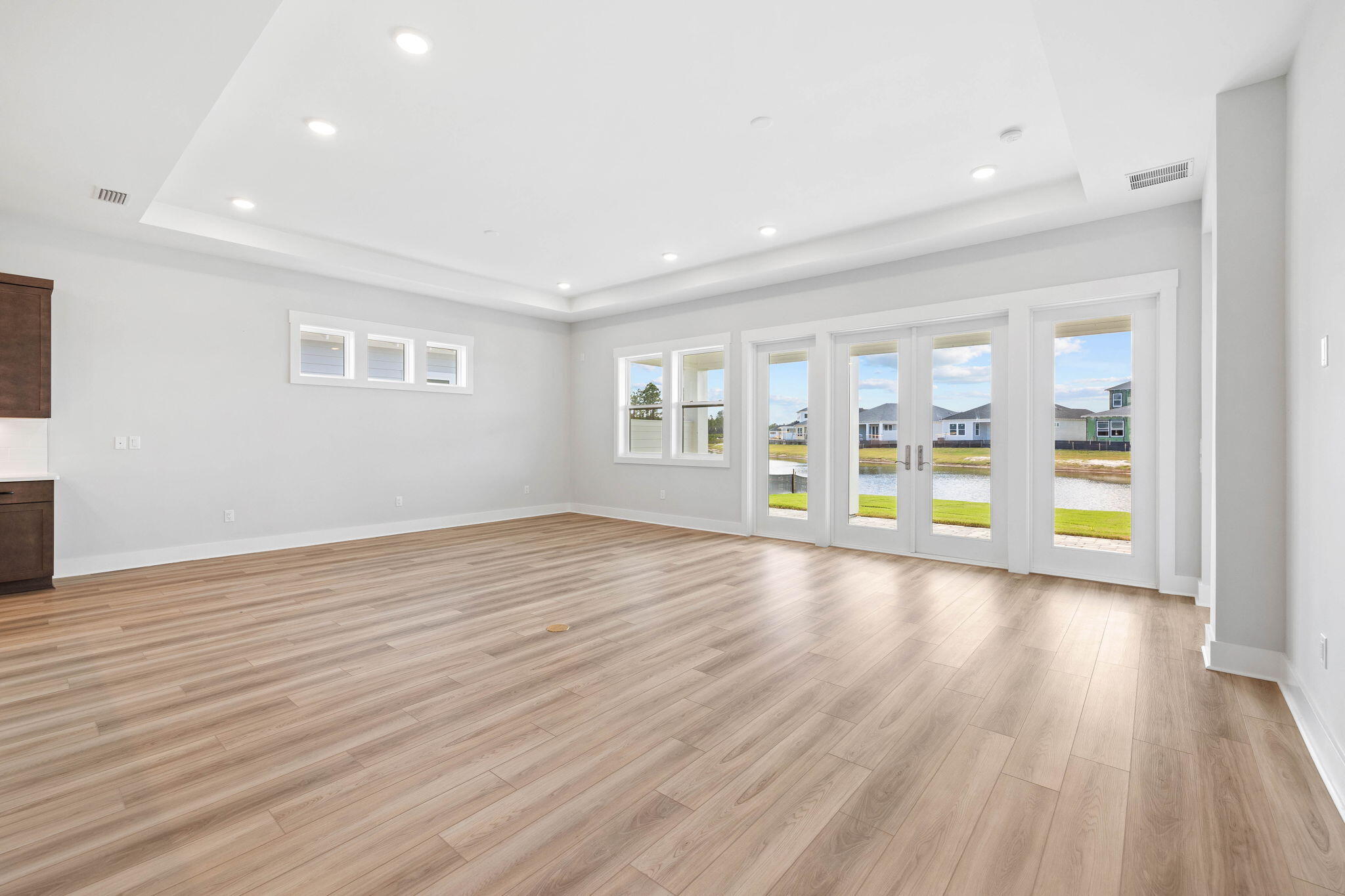 100 Anastasia Cir Inlet Beach Inlet Beach, FL 32461 - Photo 11 of 58 a view of an empty room with wooden floor and a window