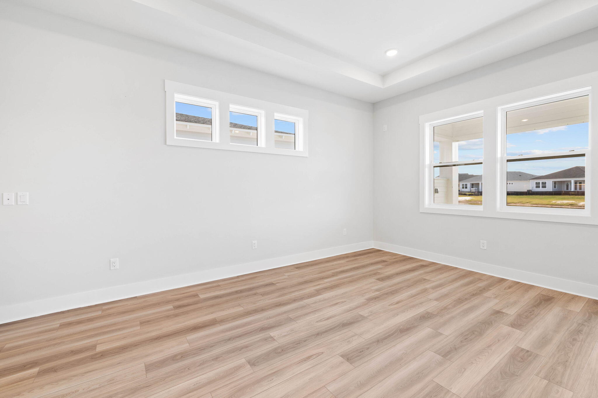 100 Anastasia Cir Inlet Beach Inlet Beach, FL 32461 - Photo 17 of 58 a view of empty room with wooden floor and fan