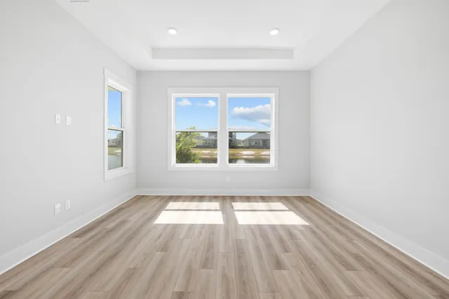 a view with a sink and a mirror