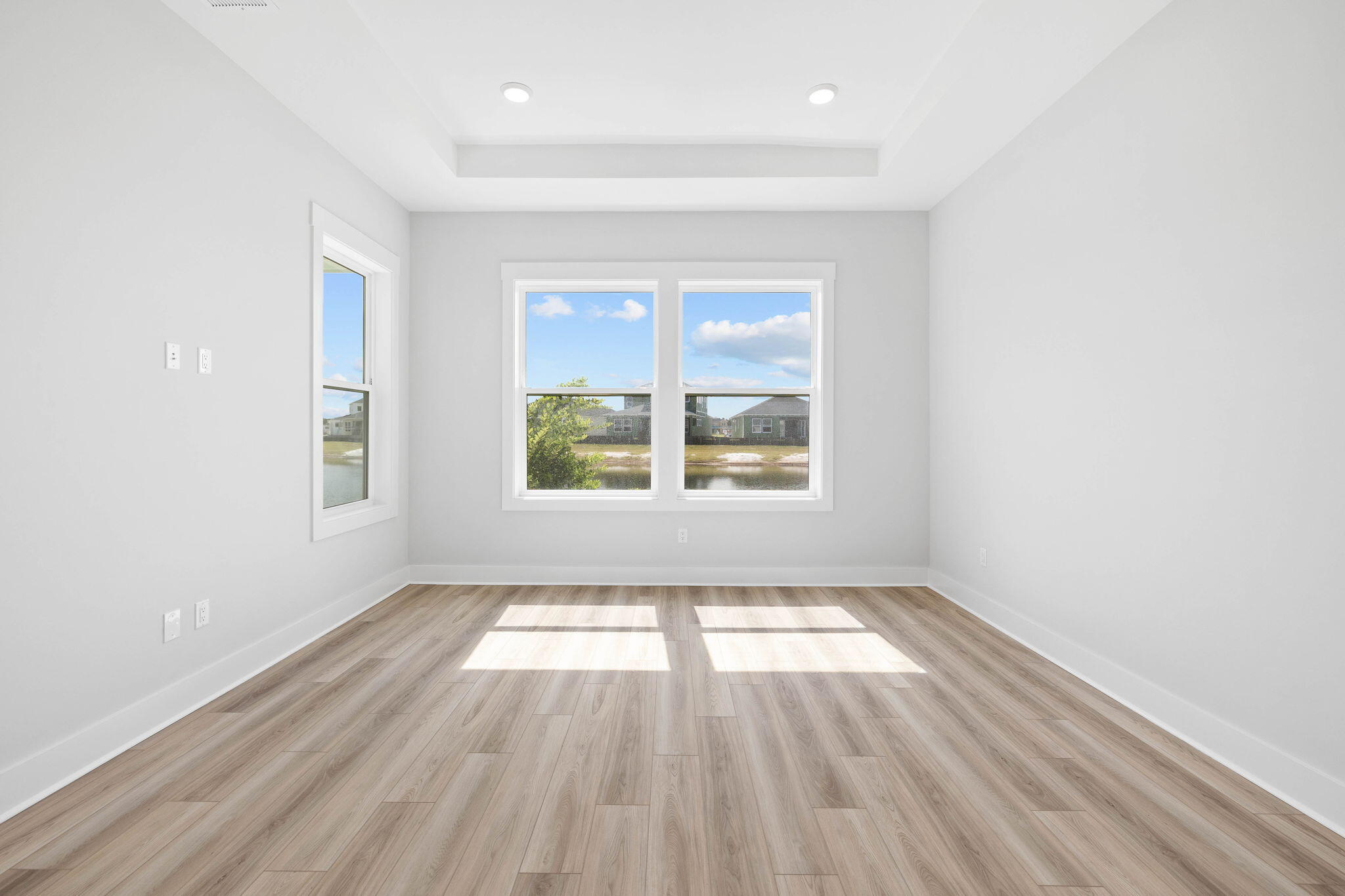 100 Anastasia Cir Inlet Beach Inlet Beach, FL 32461 - Photo 21 of 58 an empty room with wooden floor and windows