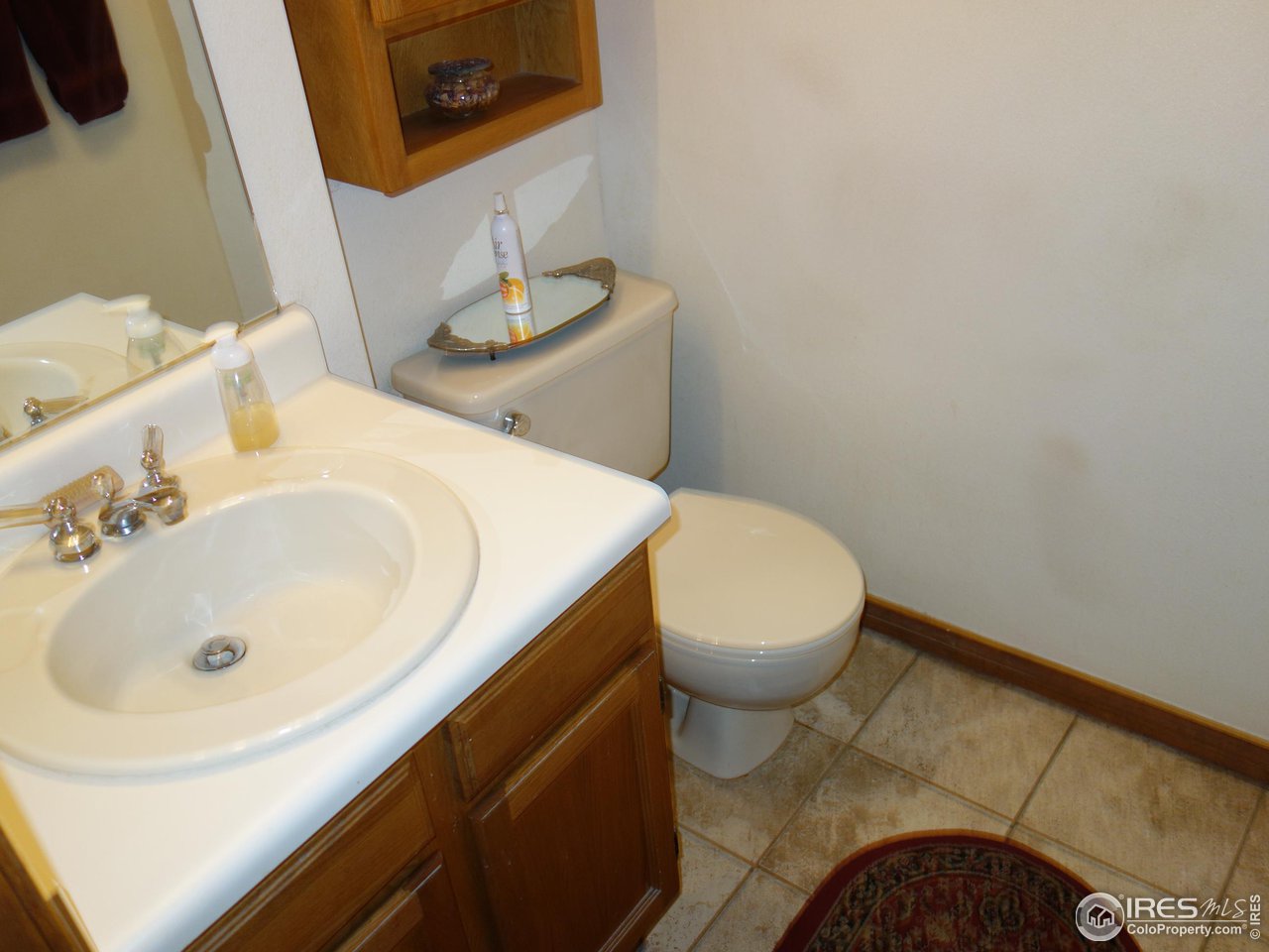 3349 Sentinel Drive Boulder, CO 80301 - Photo 21 of 25 a bathroom with a sink and a toilet
