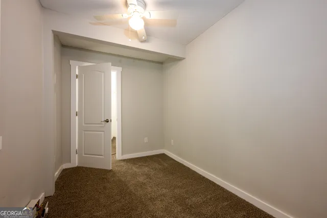 a bathroom with a sink toilet vanity and tub