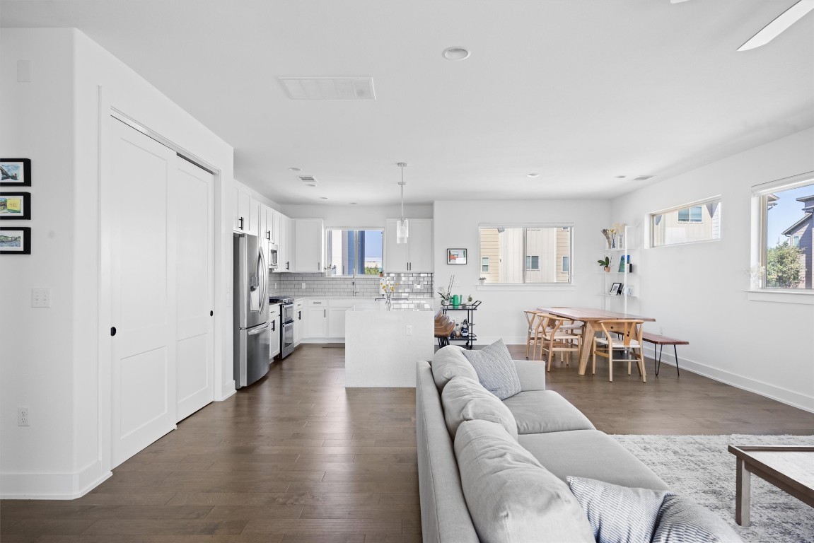 5315 La Crosse Avenue, Unit 18 Austin, TX 78739 - Photo 17 of 40 Living area with wood-style flooring and recessed lighting
