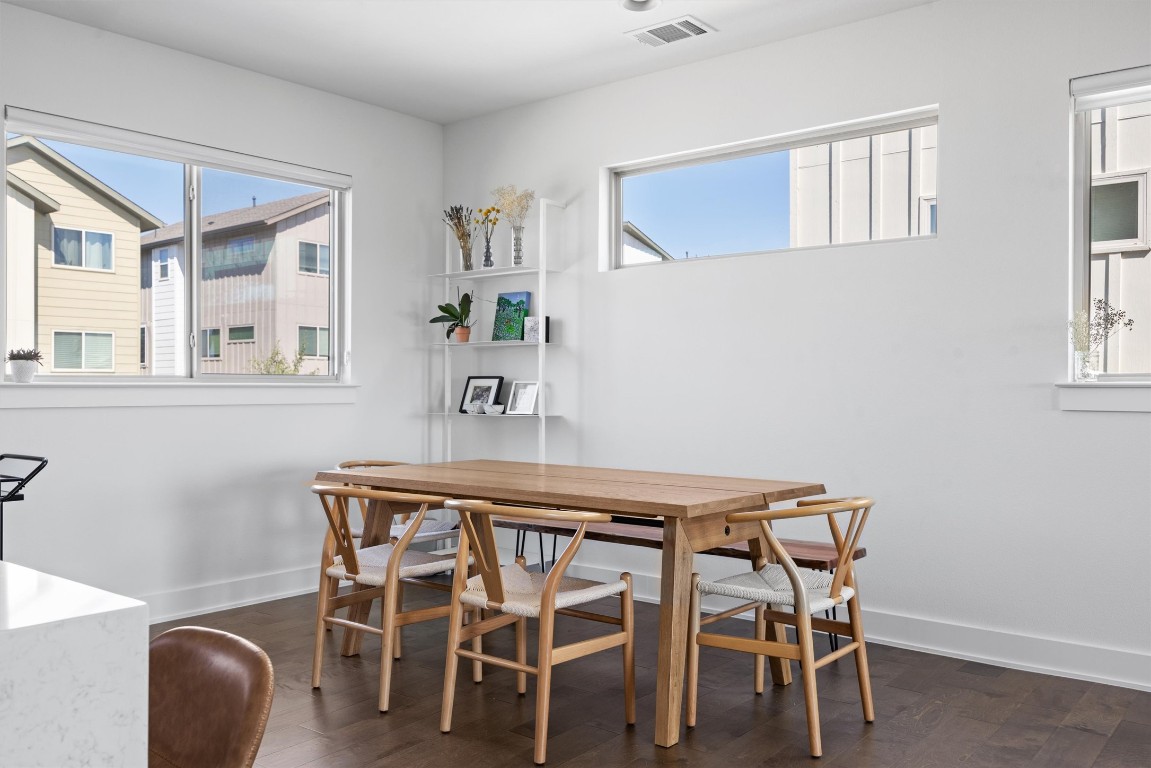 5315 La Crosse Avenue, Unit 18 Austin, TX 78739 - Photo 18 of 40 Dining area with wood-style floors and healthy amount of natural light