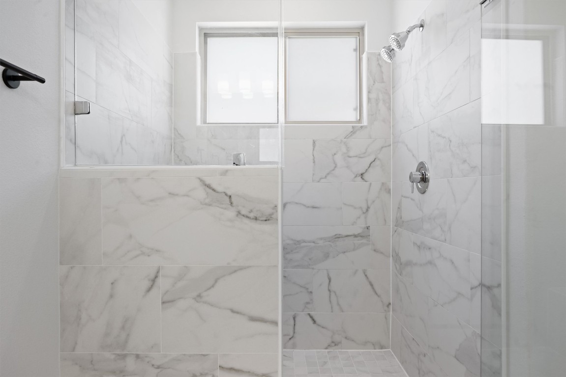 5315 La Crosse Avenue, Unit 18 Austin, TX 78739 - Photo 27 of 40 Bathroom with a marble finish shower