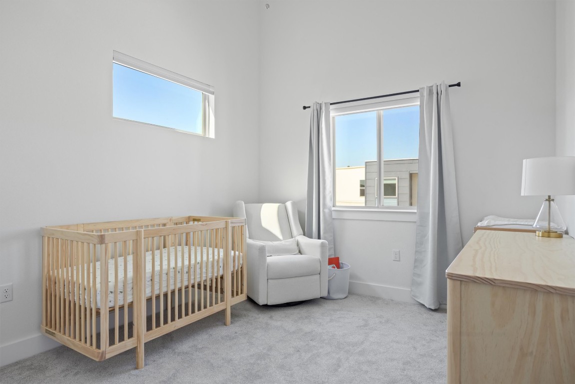 5315 La Crosse Avenue, Unit 18 Austin, TX 78739 - Photo 29 of 40 Bedroom with carpet floors and a ample natural light