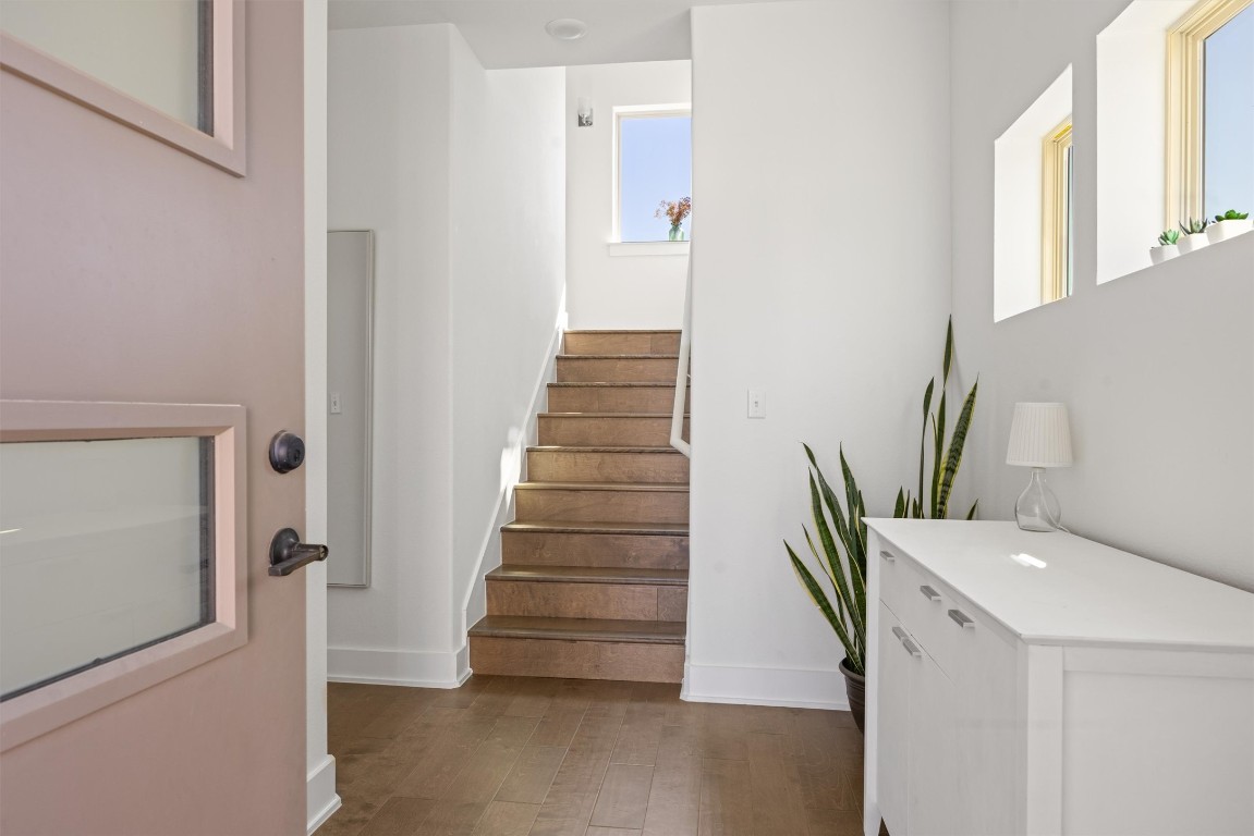 5315 La Crosse Avenue, Unit 18 Austin, TX 78739 - Photo 3 of 40 Stairway with wood finished floors and baseboards