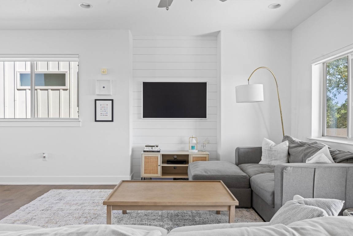 5315 La Crosse Avenue, Unit 18 Austin, TX 78739 - Photo 10 of 40 Living area with ceiling fan, wood finished floors, and recessed lighting