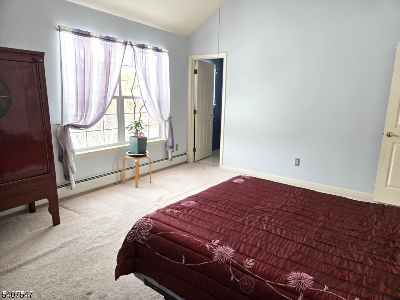 63 Halsey Road Newton, NJ 07860 - Photo 12 of 35 a bedroom with a bed and a window