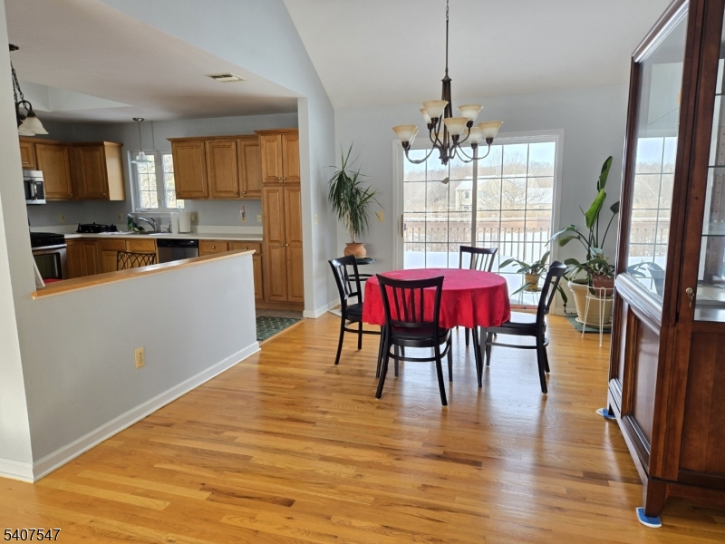 63 Halsey Road Newton, NJ 07860 - Photo 5 of 35 a view of a dining room with furniture window and wooden floor