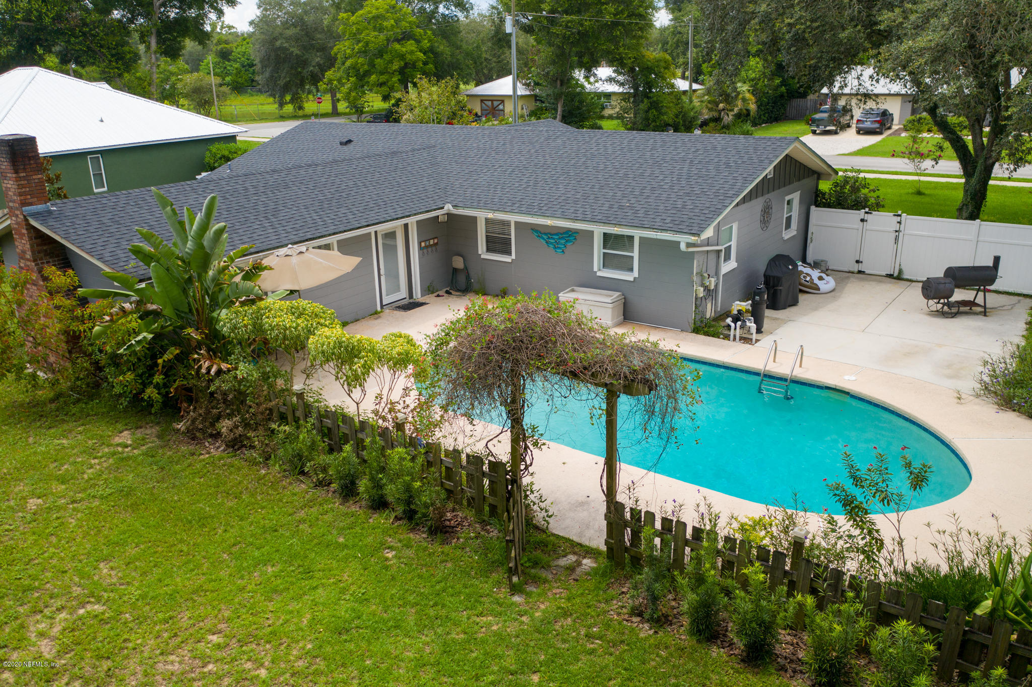 655 Pointview Road Keystone Heights, FL 32656 - Photo 3 of 38 a aerial view of a house with garden space and sitting area