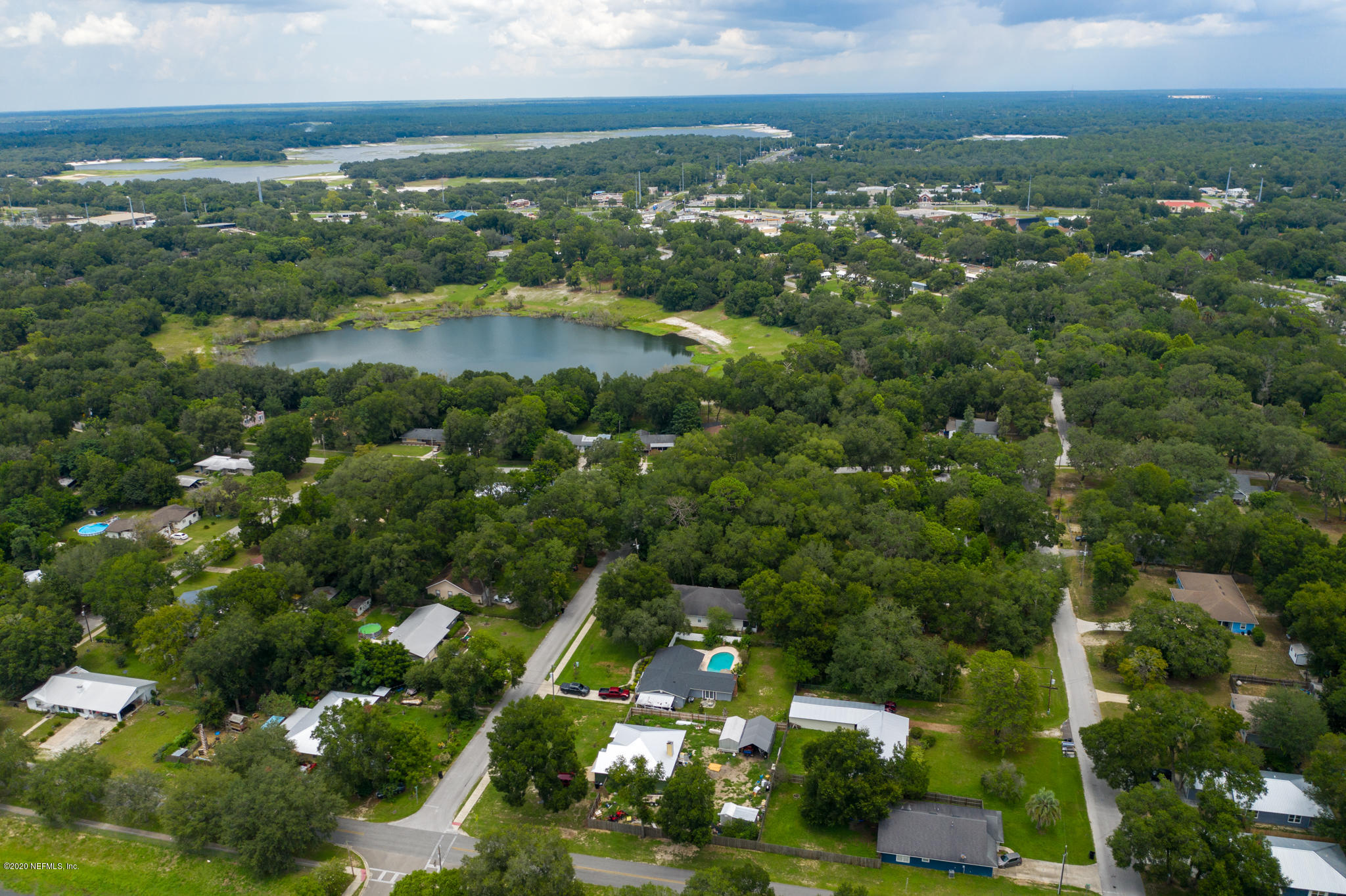 655 Pointview Road Keystone Heights, FL 32656 - Photo 33 of 38 an aerial view of residential houses with outdoor space and trees