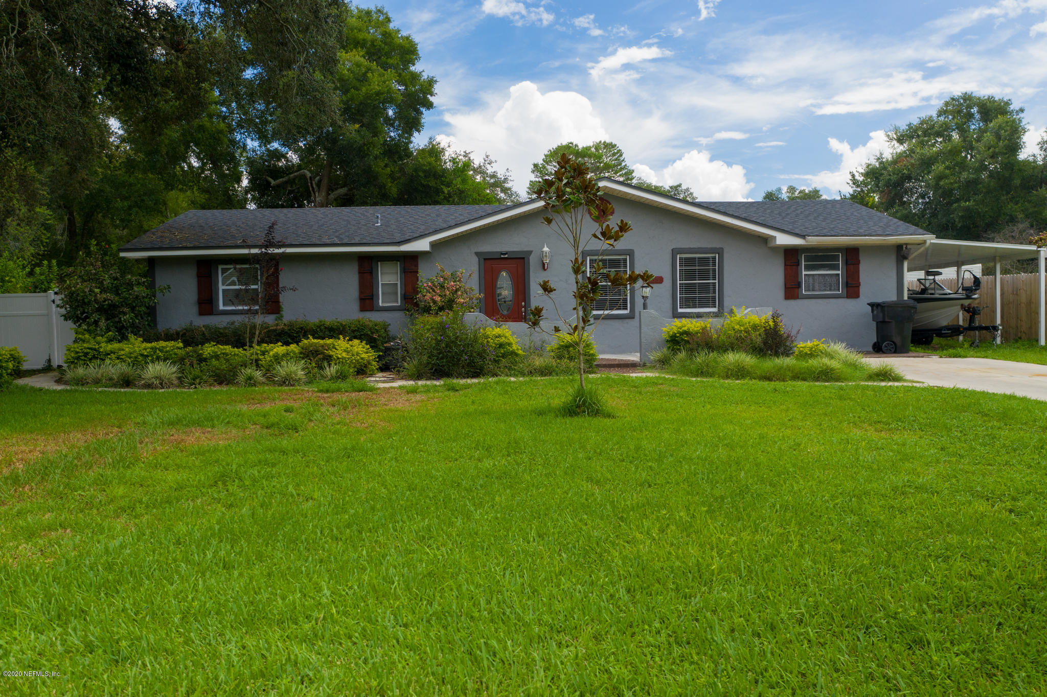 655 Pointview Road Keystone Heights, FL 32656 - Photo 38 of 38 a front view of a house with a garden