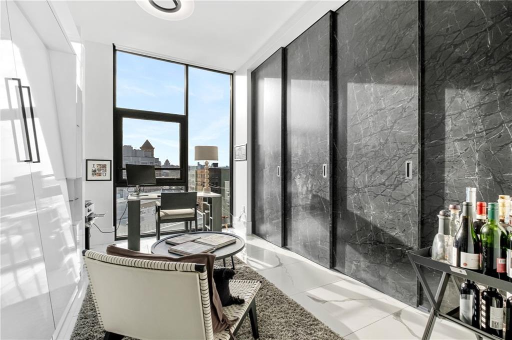 2554 Smallman Street, Unit 501 Pittsburgh, PA 15222 - Photo 26 of 45 a view of a living room and dining room