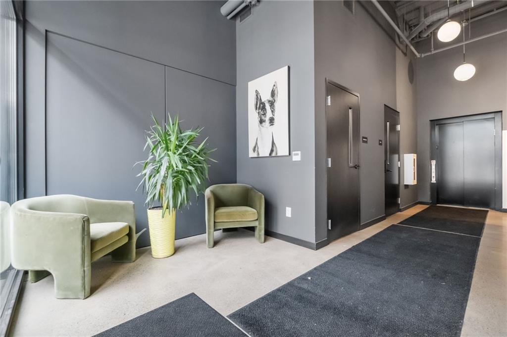2554 Smallman Street, Unit 501 Pittsburgh, PA 15222 - Photo 3 of 45 a view of livingroom with furniture and a potted plant