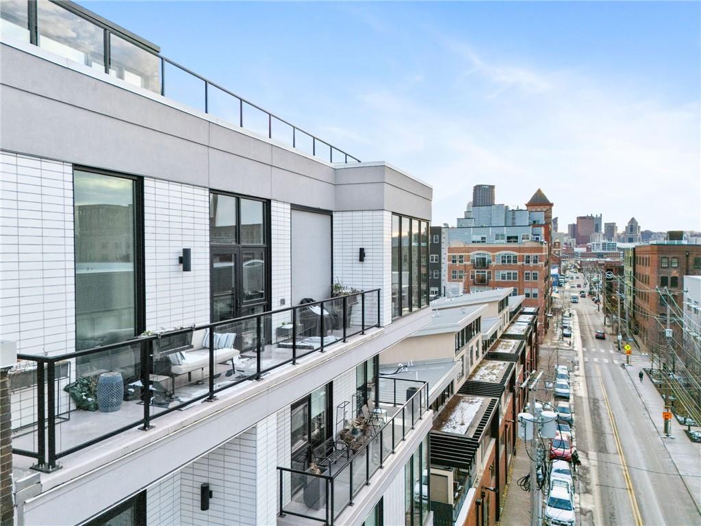 2554 Smallman Street, Unit 501 Pittsburgh, PA 15222 - Photo 33 of 45 a view of a balcony with residential houses