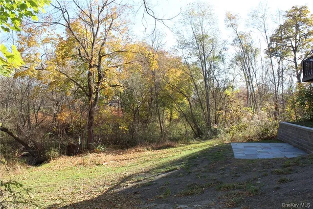 a view of a yard covered in snow