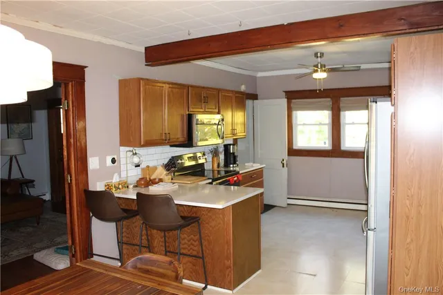 a room with furniture a window and couch