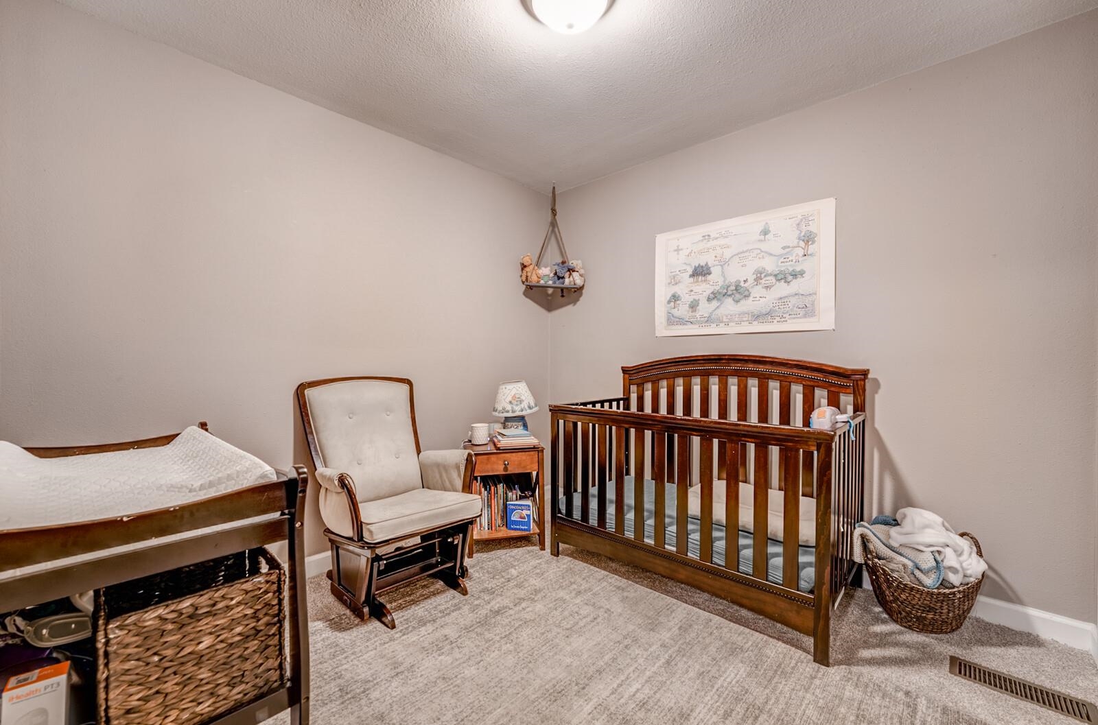 10 Raphael Cove Munford, TN 38058 - Photo 14 of 23 a bedroom with furniture and a window