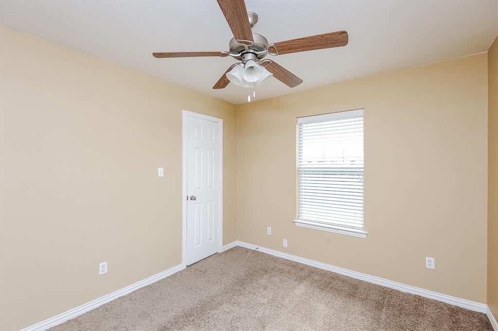 113 Currie Court Crowley, TX 76036 - Photo 12 of 16 a view of an empty room with a window