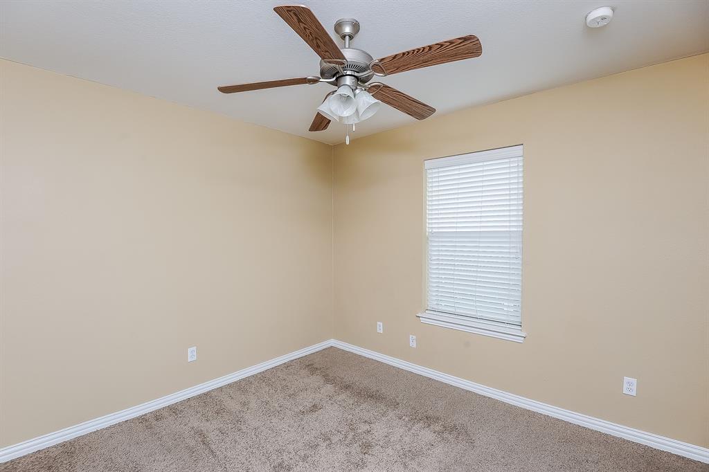 113 Currie Court Crowley, TX 76036 - Photo 13 of 16 a view of an empty room with a window