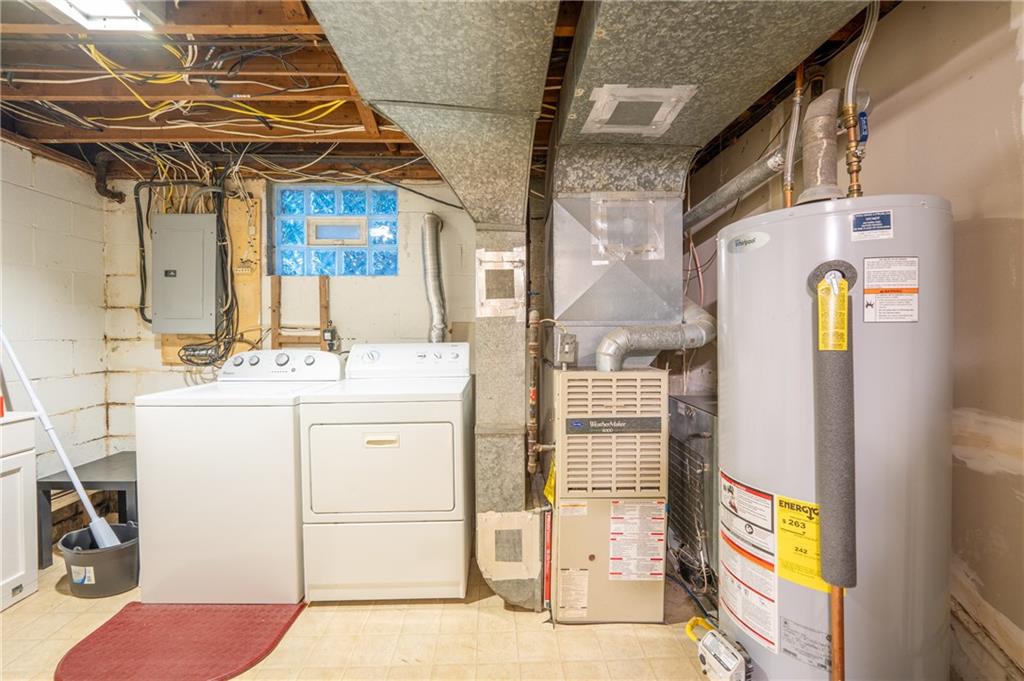 136 Long Drive Irwin, PA 15642 - Photo 30 of 50 a bathroom with a sink and mirror