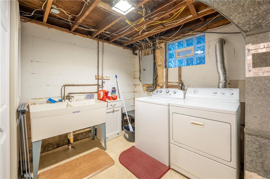 136 Long Drive Irwin, PA 15642 - Photo 31 of 50 a utility room with dryer and washer