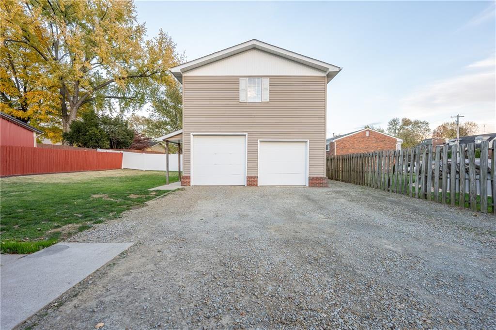 136 Long Drive Irwin, PA 15642 - Photo 38 of 50 a front view of house with yard and trees